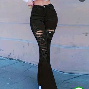 BLACK RIPPED FLARE JEANS